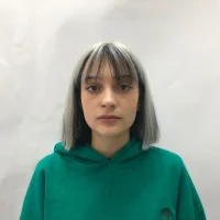 AssukaKiot Φωτ, Προφίλ