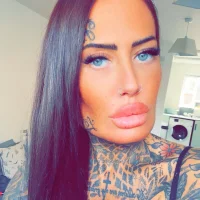 Tattooed_Boobies_MILF's Profile Pic