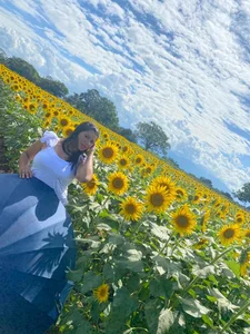 MatureHornyxxx A goodess between sunflowers Pic 7