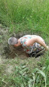 ExquisiteMature Digging an outhouse pit Poză