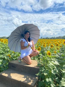 MatureHornyxxx A goodess between sunflowers Pic 5