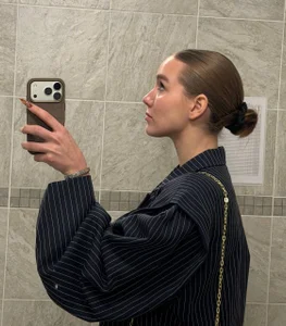 TienKnous Official style Immagine 