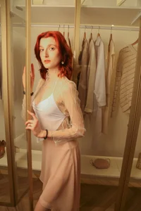 Lil_Melanie_ A playful baby chooses an outfit Pic 3