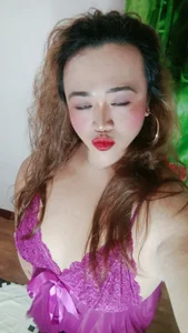 Ms_SexretaryCockTs violet dress Foto 5