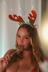 AlicePinky Christmas baby deer in sexy outfit sucks a lollipop Pic 3