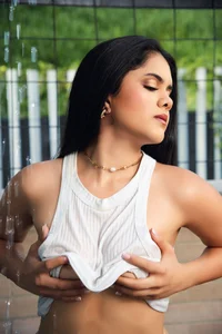 Martina-Roberts- Wet shirt, seductive face Pic