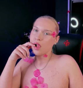 angelic_coy Let’s play together with my petals... 🌸 I promise they’re soft, a little teasing! Pic