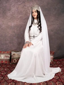Teresa_Stane Snow-white tradition 🤍The white national dress is a symbol of purity, dignity, and beauty. Bilde 3