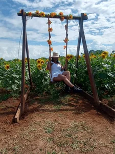 MatureHornyxxx A goodess between sunflowers Pic 6