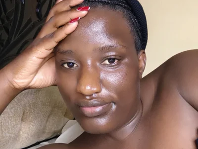 Sexysmile77 Female Kenyan Strip Webcam