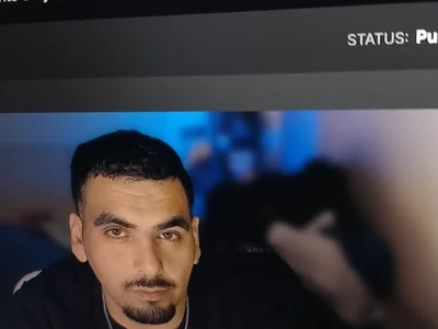 100J